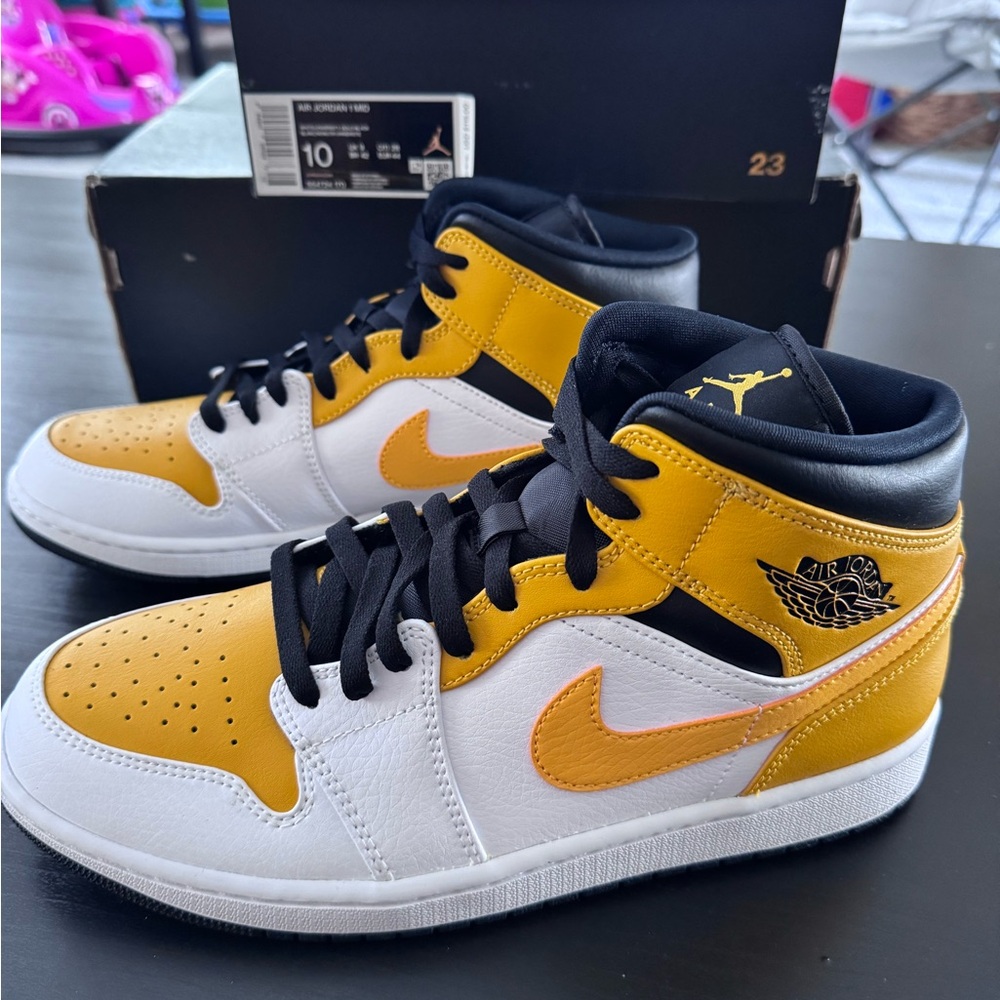 Air Jordan 1 Mid in White, University Gold and Black